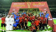 Al Rayyan’s players and officials celebrate their Sheikh Jassim Cup final victory in this last Wednesday’s file photo. 