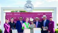 QREC GM Nasser Sherida Al Kaabi (third left) during a trophy presentation ceremony for the Qatar EBF Stallions Maiden Stakes - Duke Of Hazzar, yesterday. 