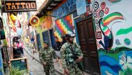 Members of the security forces walk near Bolivar square, where Colombia's President-elect Ivan Duque will be sworn in today, in Bogota, Colombia August 7, 2018. Reuters/Carlos Garcia Rawlins