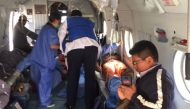 A person is transported in a helicopter after eating contaminated food at a funeral in the Peruvian Andes, authorities said on Tuesday, in Ayacucho, Peru, in this undated photo released August 7, 2018. Courtesy of Agencia Andina/Coen Handout via Reuters