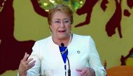 In this file photo taken on January 08, 2018 Chilean President Michelle Bachelet delivers a speech at the Pedagogical School Salvador Allende where she arrived to hand a Chilean national flag, in Havana.  AFP / Yamil Lage
 
