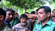 At least 20 plain-clothes officers picked up Shahidul Alam, 63, at his Dhaka home late on Sunday, hours after his critical comments were broadcast on Al Jazeera (Munir Uz Zaman/AFP) 