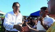 Peru's President Martin Vizcarra greets people as he arrives to the inauguration of a mental hospital in Pucallpa, Peru August 9, 2018. Reuters/Guadalupe Pardo 
