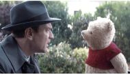 Still of the actor Ewan McGregor (L) and Pooh from the movie Christopher Robin