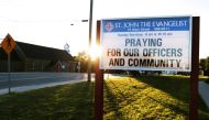 A message at the St. John the Evangelist Anglican Church notifies the community of a prayer vigil after a shooting incident in Fredericton, New Brunswick, Canada, August 10, 2018. Reuters/Dan Culberson 
 
 