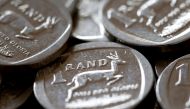 South African rand coins are seen in this photo illustration taken September 9, 2015. Reuters/Mike Hutchings