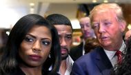 In this file photo, Omarosa Manigault Newman (L) appears alongside Republican presidential hopeful Donald Trump during a press conference that followed Trump's meeting with African-American religious leaders in New York. (AFP / Timothy A. CLARY / File pho