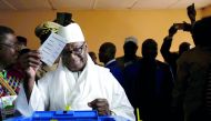 FILE PHOTO: Ibrahim Boubacar Keita, President of Mali and candidate for Rally for Mali party (RPM), casts his vote at a polling station during the presidential election in Bamako, Mali July, 29 2018. Reuters/Luc Gnago