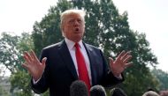 U.S. President Donald Trump speaks to reporters upon his departure from the White House in Washington, U.S., August 17, 2018. REUTERS/Kevin Lamarque/File Photo