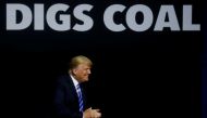 US President Donald Trump acknowledges the crowd at a Make America Great Again rally at the Civic Center in Charleston, West Virginia, U.S., August 21, 2018. REUTERS/Leah Millis TPX IMAGES OF THE DAY 