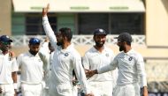 India's captain Virat Kohli (C) waves after winning the fourth day of the third Test cricket match between England and India at Trent Bridge in Nottingham, central England on August 21, 2018. (AFP / Paul ELLIS)
