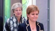 Britain's Prime Minister Theresa May and Scotland's First Minister Nicola Sturgeon arrive at the University of Edinburgh before signing the Edinburgh and South East Scotland City Region Deal in Edinburgh, Scotland, August 7, 2018.  Jane Barlow/Pool via Re