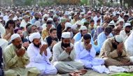 Pakistani Muslims offer Eid al-Adha prayers outside a mosque in Quetta on August 22, 2018. AFP / Banaras Khan