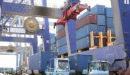 Image used for illustrative purpose. Trucks carrying containers are seen at the Port of Aqaba