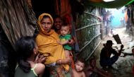 Rohingya refugees are seen outside of their makeshift tent in the Kutupalong camp in Cox's Bazar, Bangladesh August 24, 2018. Reuters/Mohammad Ponir Hossain