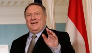 File photo of US Secretary of State Mike Pompeo waves to the media before his meeting with Egyptian Foreign Minister Sameh Shoukry at the State Department in Washington, US, August 8, 2018. REUTERS/Yuri Gripas/File Photo