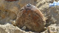 A World War II aerial bomb to be defused after it was found on a construction site in Ludwigshafen, western Germany, is pictured on August 26, 2018. Around 18,500 people had to leave their houses in an evacuation measure due to the bomb disposal. - German