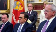 (L-R) Mexico's Foreign Minister Luis Videgaray, Mexico's Economy Minister Ildefonso Guajardo, White House chief economic adviser Larry Kudlow (standing) and Jesus Seade, Mexico's President-elect Obrador's representative in trade negotiations look on as U.