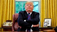 US President Donald Trump sits behind his desk as he announces a bilateral trade agreement with Mexico to replace the North American Free Trade Agreement (NAFTA) at the White House in Washington, US, August 27, 2018. REUTERS/Kevin Lamarque