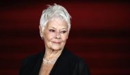 (FILE PHOTO) In this file photo taken on November 02, 2017 English actress Dame Judi Dench poses upon arrival to attend the world premiere of the film 'Murder on the Orient Express' at the Royal Albert Hall in west London.  AFP / POOL / Tolga AKMEN