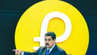 
In this file photo taken on February 20, 2018 Venezuela's President Nicolas Maduro gestures during a press conference to launch to the market a new oil-backed cryptocurrency called 