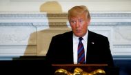 US President Donald Trump speaks at a dinner to honor evangelical leadership in the State Dining Room at the White House in Washington, D.C., US August 27, 2018. REUTERS/Leah Millis