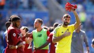 Liverpool's Alisson celebrates after the match.  Reuters/Carl Recine 

