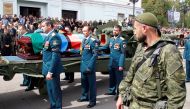 The casket of Prime Minister of the self-proclaimed Donetsk People's Republic Alexander Zakharchenko is carried during the funeral in Donetsk, Ukraine, September 2, 2018. REUTERS/Alexander Ermochenko