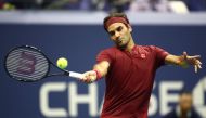 Roger Federer of Switzerland returns the ball during the men's singles fourth round match against John Milman of Australia on Day Eight of the 2018 US Open at the USTA Billie Jean King National Tennis Center on September 3, 2018 in the Flushing neighborho