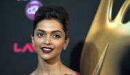 Indian film star Deepika Padukone walks the green carpet as she arrives for the 15th annual International Indian Film Awards in Tampa, Florida, April 26, 2014. Reuters/Steve Nesius