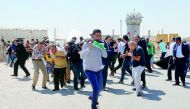 Israeli forces disperse Palestinian journalists during a protest, which was organized by Palestinian Journalists Syndicate, to show solidarity with Palestinian journalist Ali Dar Ali, who remains incarcerated in Israel’s Ofir prison, demanding his release