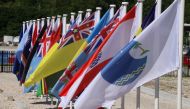 This picture taken on September 5, 2018 shows flags from the Pacific Islands countries being displayed in Yaren on the last day of the Pacific Islands Forum (PIF). AFP / Mike Leyral 