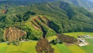  This picture shows an aerial view of a landslide in Atsuma town, Hokkaido prefecture on September 6, 2018, after an earthquake hit the northern Japanese island of Hokkaido. AFP / JIJI PRESS / JIJI PRESS