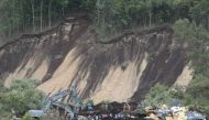 Rescue workers search for missing people in Astuma on September 8, 2018 after a 6.6-magnitude earthquake hit the northern Japanese island of Hokkaido on September 6. Japan OUT / AFP / JIJI PRESS / Jiji Press 