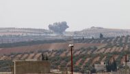 Smoke rises after war planes belonging to Assad Regime and Russia carried out airstrikes at the Khan Shaykhun district of Idlib, Syria on September 8, 2018. Ekrem Masry - Anadolu