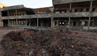 A view of the damage in the Iranian Kurdistan Democratic Party (KDPI) headquarters after a rocket attack in Koysinjaq, 100 kilometres east of Arbil, the capital of the autonomous Kurdish region of eastern Iraq. AFP / SAFIN HAMED
