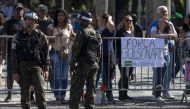 A banner supporting Brazilian presidential candidate Jair Bolsonaro is seen during a military parade to commemorate Brazil's Independence Day in downtown Rio de Janeiro, Brazil, on September 07, 2018.  AFP / Mauro Pimentel
