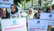 Palestinians stage a protest against US decision to cut funding to the United Nations Relief and Works Agency for Palestine Refugees in Gaza City, Gaza on September 4, 2018. (Mustafa Hassona/Anadolu Agency)