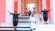 Children play on the Music steps at Qanat Quartier. 
