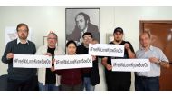 Members of the Union of Journalists of the state of Sao Paulo pose together in the union's headquarter to show solidarity for Reuters journalists Wa Lone, 32, and Kyaw Soe Oo, 28, who are imprisoned in Myanmar, in Sao Paulo, Brazil September 10, 2018. REU