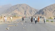 People are seen at site after a suicide blast ripped through a crowd of protesters in Nanganhar province of Afghanistan on September 11, 2018. ( Zabihullah Ghazi - Anadolu Agency )
 