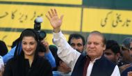 FILE PHOTO: Nawaz Sharif (R), former Prime Minister and leader of Pakistan Muslim League, gestures to supporters as his daughter Maryam Nawaz looks on during party's workers convention in Islamabad, Pakistan June 4, 2018. REUTERS/Faisal Mahmood/File Photo