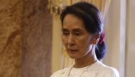 Myanmar State Counsellor Aung San Suu Kyi arrives for a meeting with Vietnam's President Tran Dai Quang (not pictured) at the Presidential Palace at the sideline of the World Economic Forum on ASEAN in Hanoi on September 13, 2018. AFP / POOL / KHAM