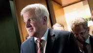 German Interior Minister Horst Seehofer and Hans-Georg Maassen (R), President of the domestic intelligence service of the Federal Republic of Germany (Bundesamt fuer Verfassungsschutz, BfV) leave after they faced a parliamentary committee of domestic and 