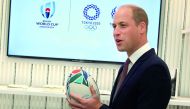 Britain's Prince William holds an official rugby ball for the Rugby World Cup 2019 at the official opening of Japan House in London, Britain, September 13, 2018. Tim P. Whitby via Reuters 