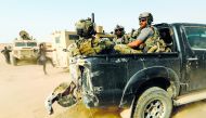 US-backed forces are pictured near the village of Susah in the eastern province of Deir Ezzor, near the Syrian border with Iraq on September 13, 2018. AFP / Delil souleiman
