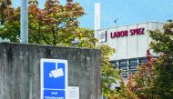A sign warning of CCTV area controlled is seen next to the Spiez Laboratory, Swiss Federal Institute for NBC-Protection (nuclear, biological, chemical), on September 14, 2018 in Spiez, 40km from the capital Bern as Swiss newspapers reported that two Russi
