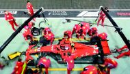 Ferrari's Finnish driver Kimi Raikkonen takes a pit stop during the second practice session at the Marina Bay Street Circuit ahead of the Singapore Formula One Grand Prix in Singapore on September 14, 2018. AFP / Manan Vatsyayana