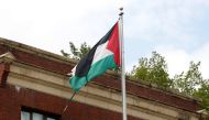 A tattered flag flies over the Palestine Liberation Organization (PLO) office two days after President Donald Trump's national security adviser John Bolton announced that the State Department would close the PLO office in Washington, U.S., September 12, 2