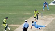 (FILES) In this file photo taken on February 13, 2006 Indian bowler Zaheer Khan (C) drops a catch off Pakistani batsman Imran Farhat (2nd from top) during the third one day international match between Pakistan and India at the Gaddafi Cricket Stadium in L